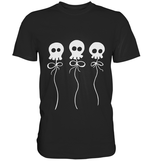 Schwarzes T-Shirt mit drei kleinen weißen Skulls, die an einer Schnur hängen wie Ballons
